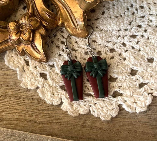 Christmas-y coffin dangles